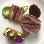 Slow Cooked “Aussie Lamb” Top Sirloin with House Made Lamb Bacon, Potato Pave, Puree of English Peas, Périgord Truffle and Spring Vegetable Salad, Lamb Reduction