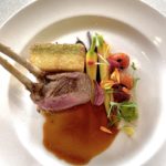 Herb Butter Roasted Rack of Australian Lamb with Lamb Jus, Mint Chimichurri, Baby Carrots, Blistered Tomatoes, Pickled Pearl Onions