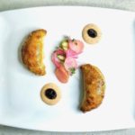 Lamb Empanadas with Harissa Yogurt, Tamarind Sauce, Pickled Vegetables