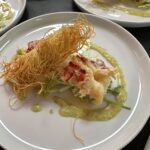 Butter-Poached Lobster Tail with Citrus Tarragon Vinaigrette, Frisee and Kataifi Crouton