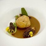 Porcini Veloute with Pate a Choux Wild Mushroom Mousse, Summer Pea Foam, Crisp Morels, Fried Sage, Flower Variations