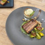 Bone-In Chorizo Pork Belly with Ensalada Chicharrón con Arroz, Heirloom Tomato ‘Pico,’ Salsa de Suegra, Margarita 