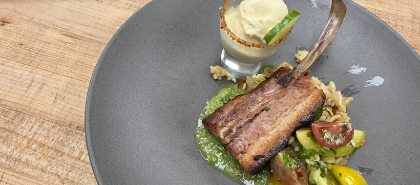 Bone-In Chorizo Belly with Ensalada Chicharrón con Arroz